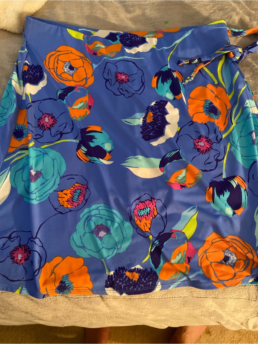 Susan Graver Blue Floral skirtwith Orange Accent and bike shorts